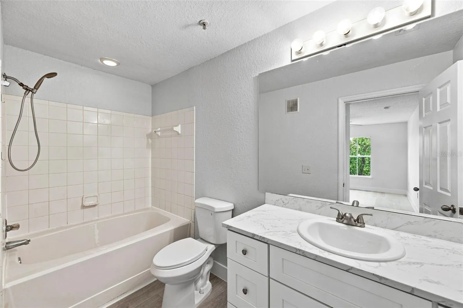 Bedroom 1 ensuite full bath NEW cabinet toilet showerhead