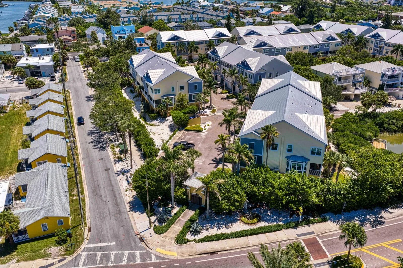 Drone view showing pedestrian gate, leading straight to the crosswalk to the beach.