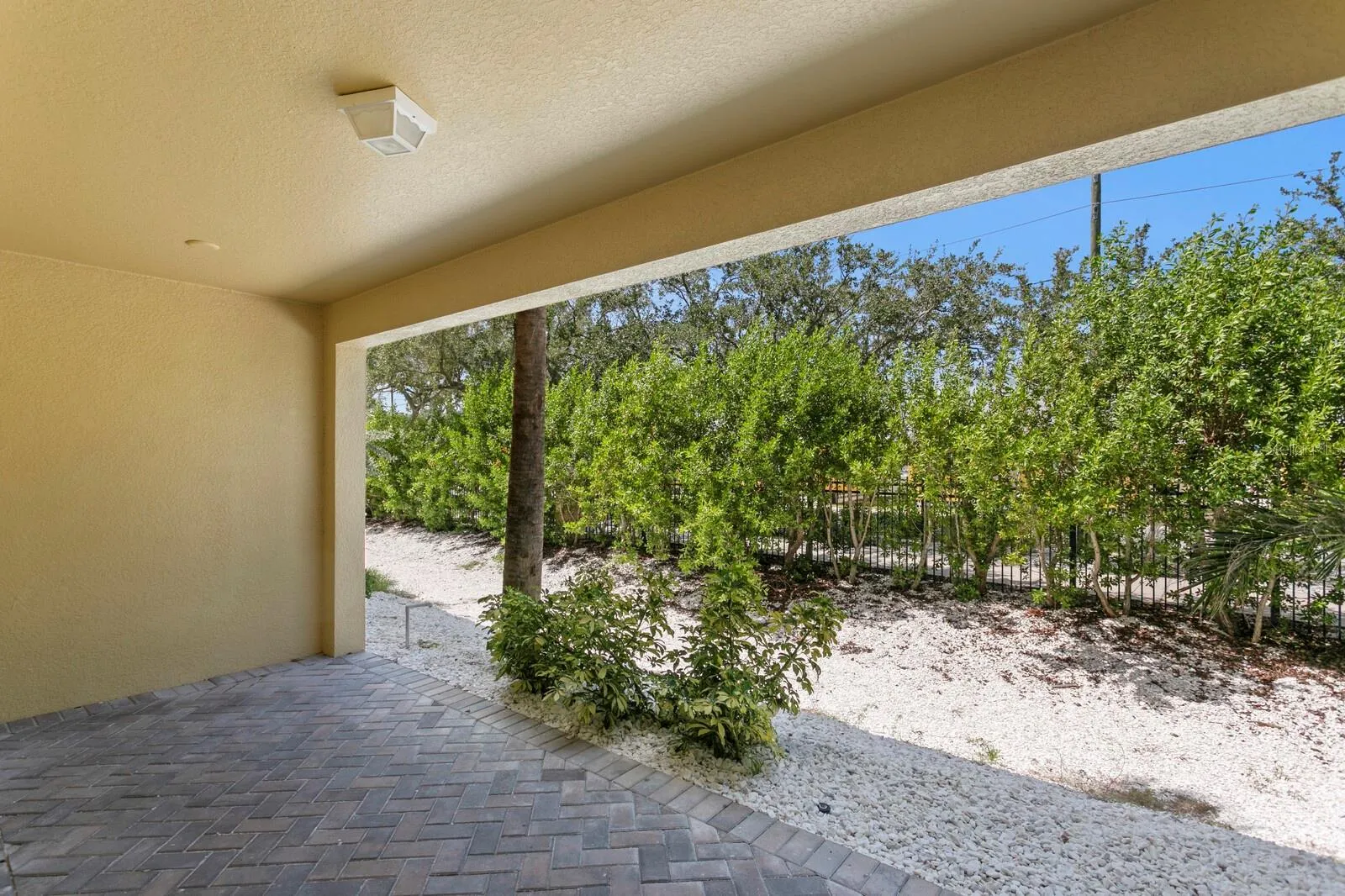 Garage leads out to covered patio