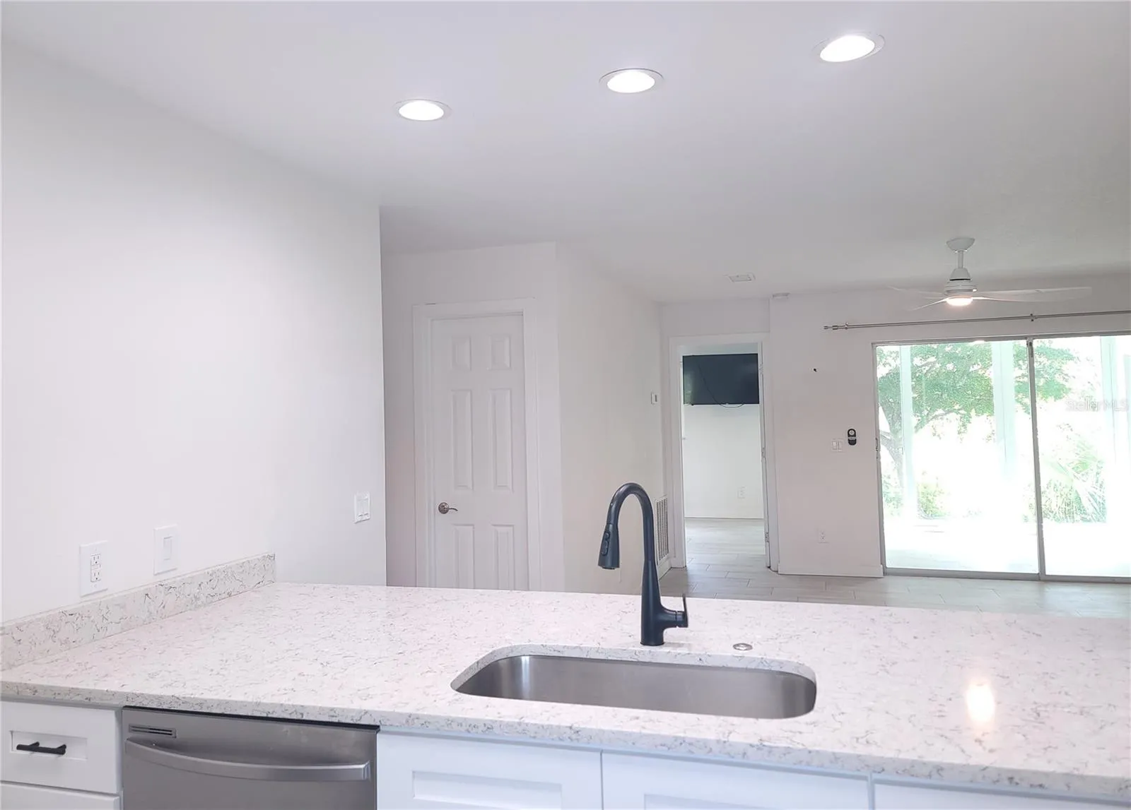 open kitchen to living room and lanai view