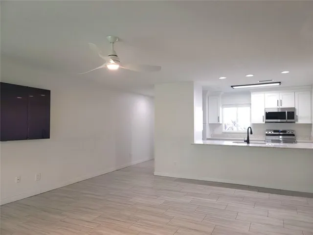 living room looking to kitchen
