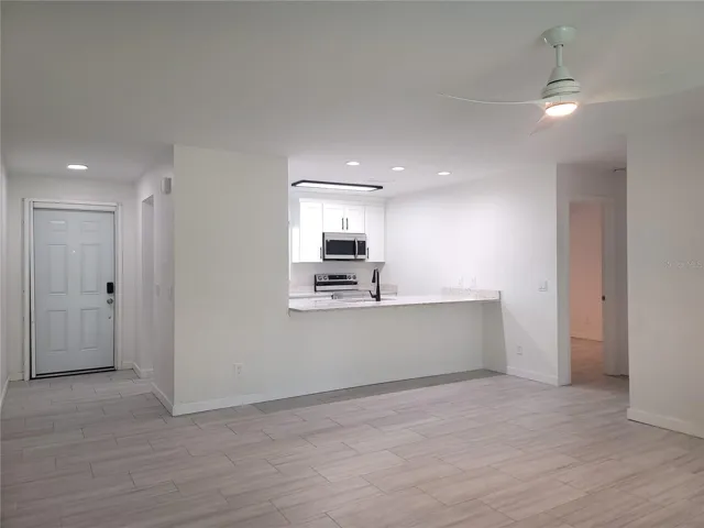 living room looking to kitchen