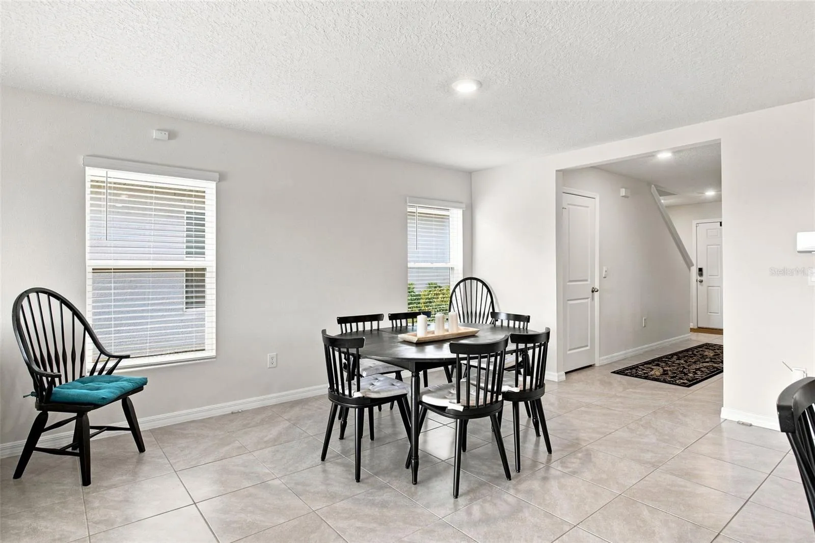 Dining area adjacent to the kitchen and countertop seating