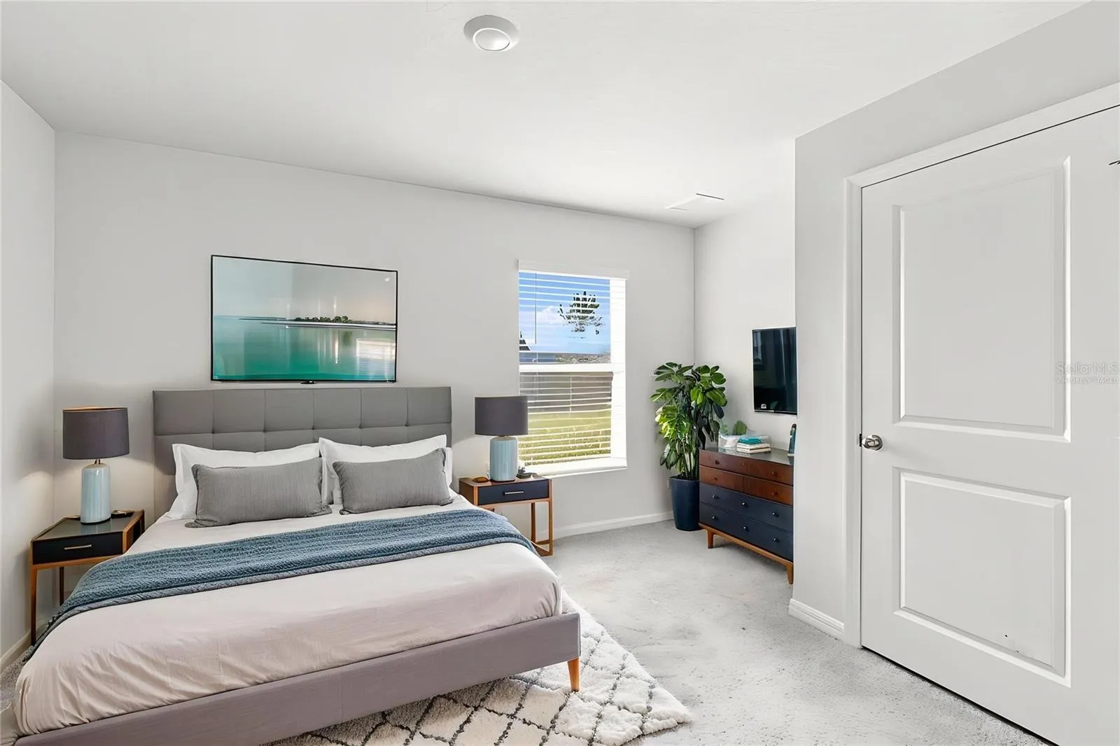 Virtually staged first floor guest bedroom