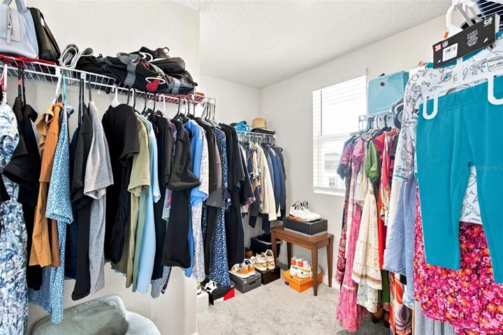 Huge primary walk-in closet