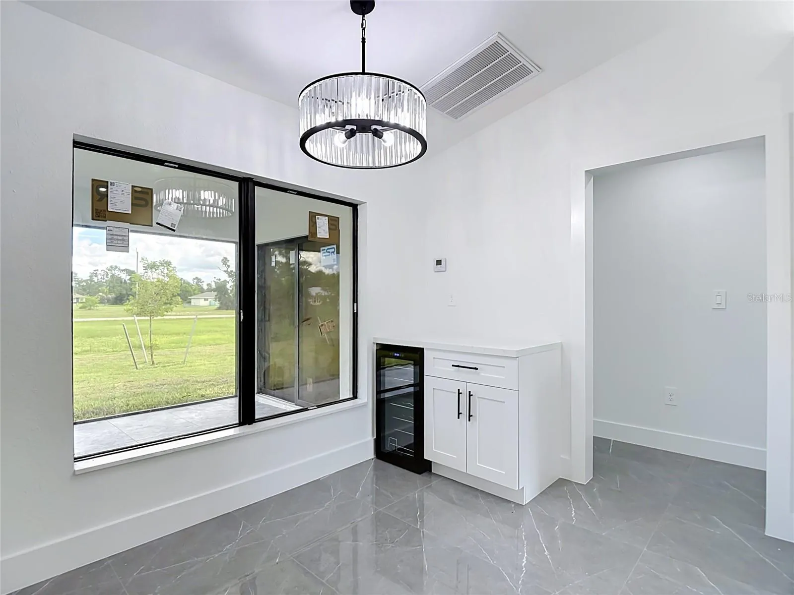 Wine/Coffee bar with wine fridge and what a view out of the extra large windows!