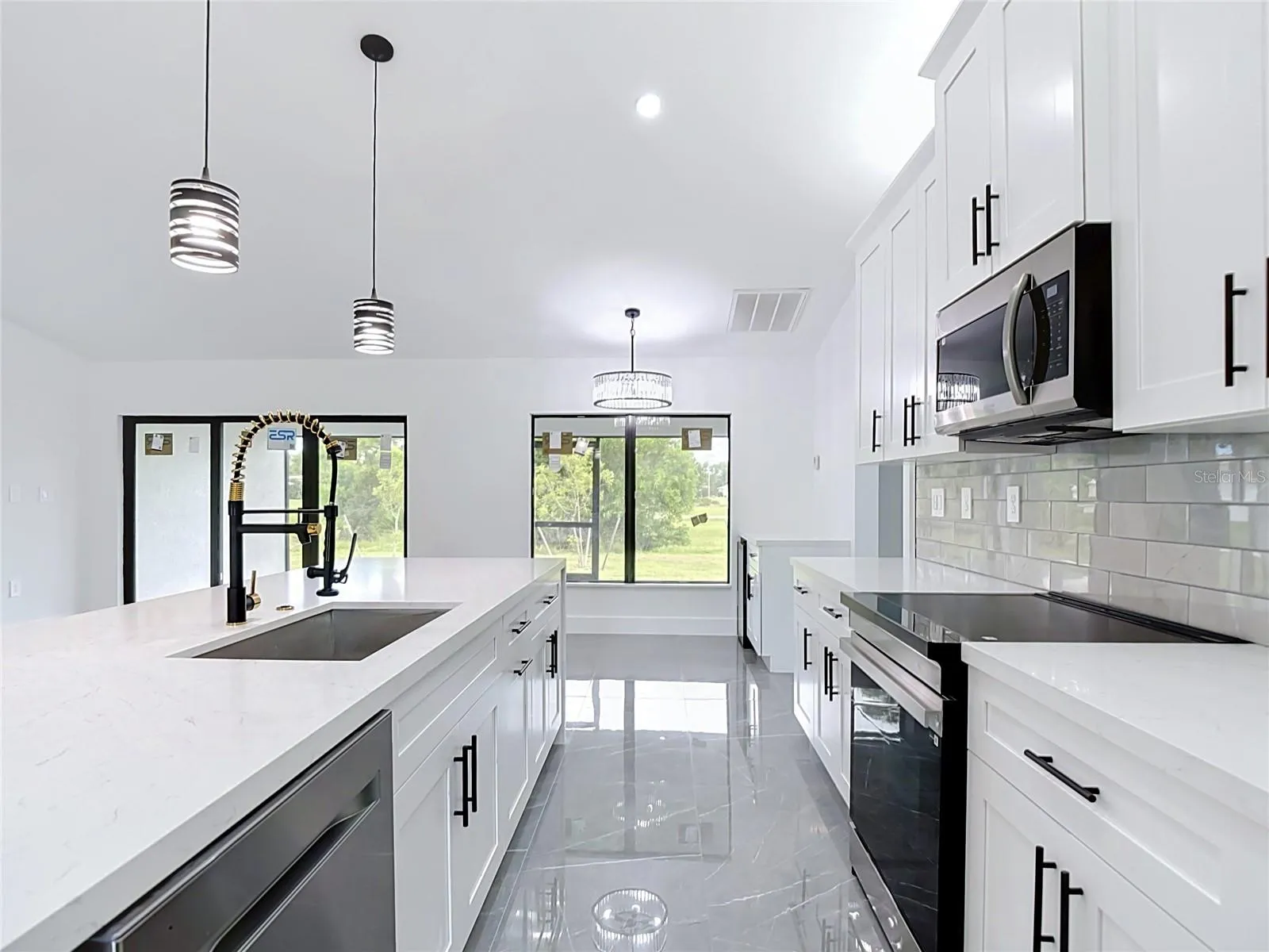 Another view of the kitchen cabinetry
