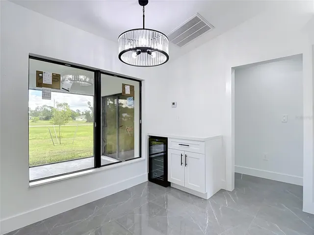 Wine/Coffee bar with wine fridge and what a view out of the extra large windows!