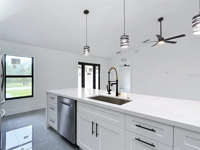 Plenty of cabinets even on this huge island