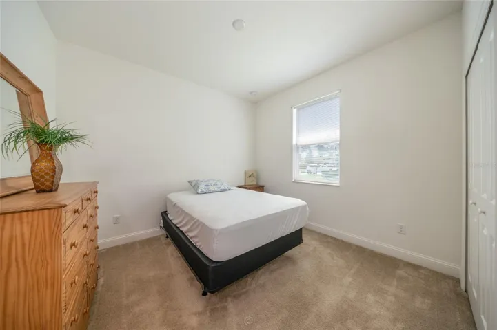 UNSTAGED 3RD BEDROOM. THIS FURNITURE CONVEYS