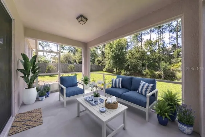 SCREENED PATIO WITH PRIVATE BACKYARD