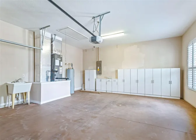 2 Car Garage w/Utility Sink & additional storage