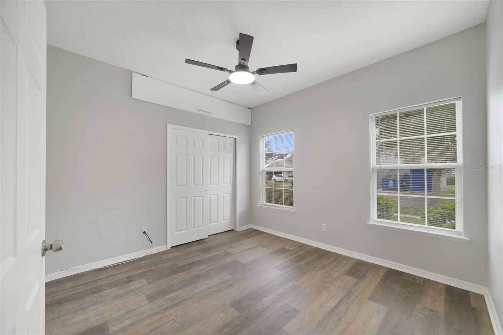 All three Bedrooms and both UPDATED BATHROOMS feature stylish LUXURY VINYL PLANK FLOORING.