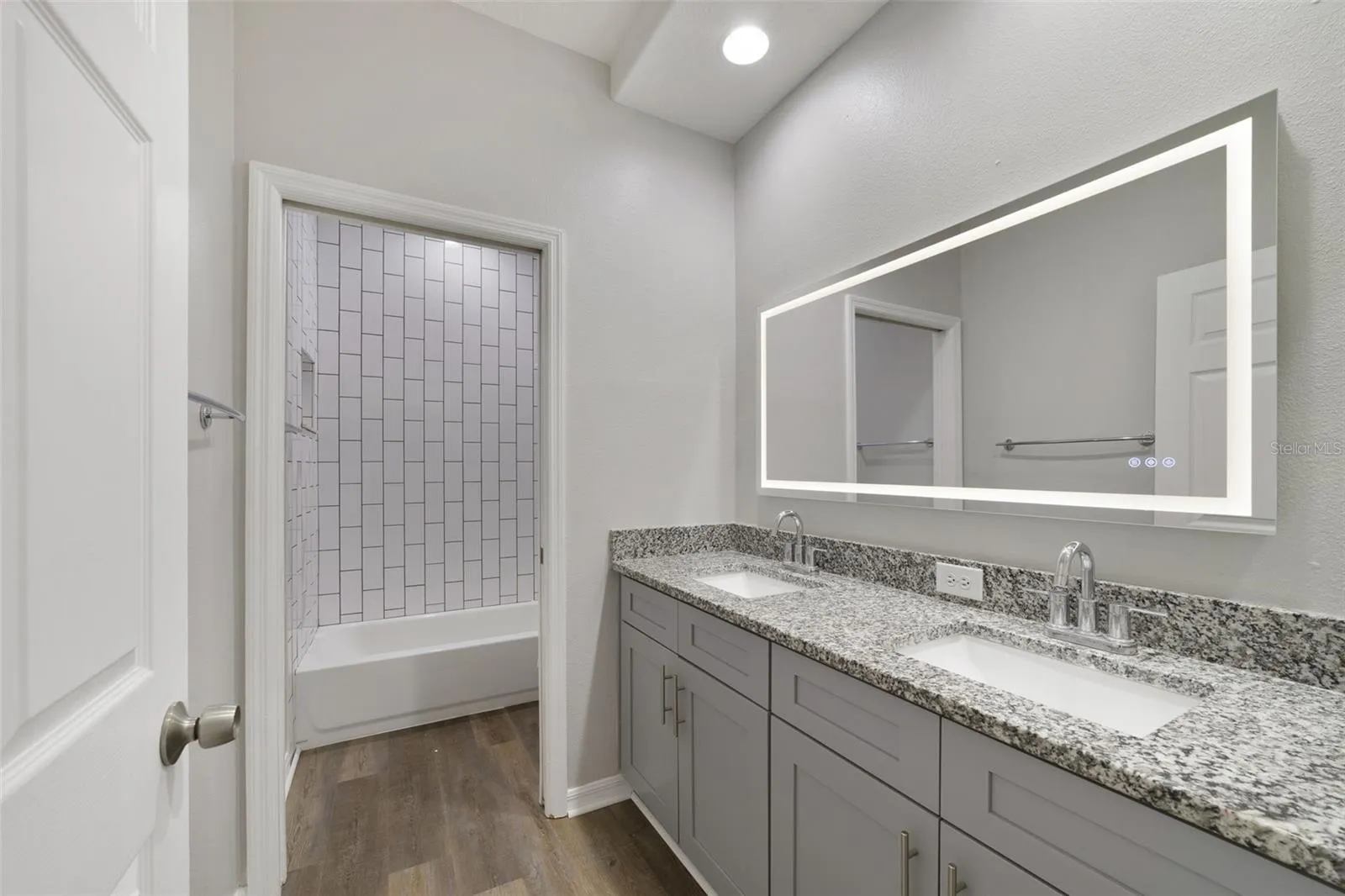 Two additional Bedrooms share the SECOND UPDATED FULL BATH, providing comfortable space for family, guests or a home office.