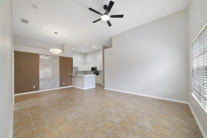 The Dining Room adds a touch of character with a beautiful ACCENT WALL creating an inviting space for everything from casual dinners to holiday gatherings.