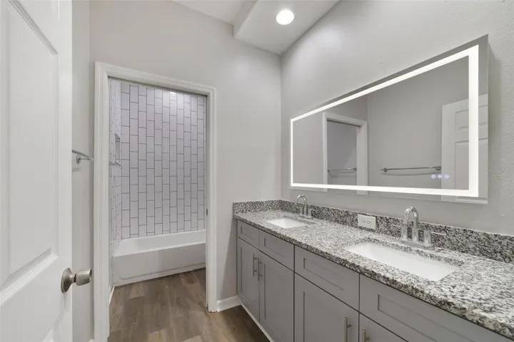 Two additional Bedrooms share the SECOND UPDATED FULL BATH, providing comfortable space for family, guests or a home office.