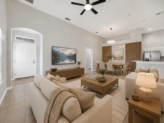 The Living Room boasts great natural light and sleek tile flooring for a fresh, airy feeling. Virtually Staged