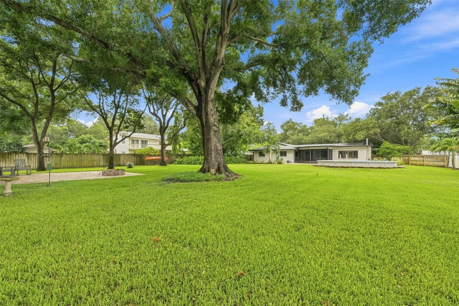 This incredible home offers privacy and land, the best of country living without giving up the amenities of city life.