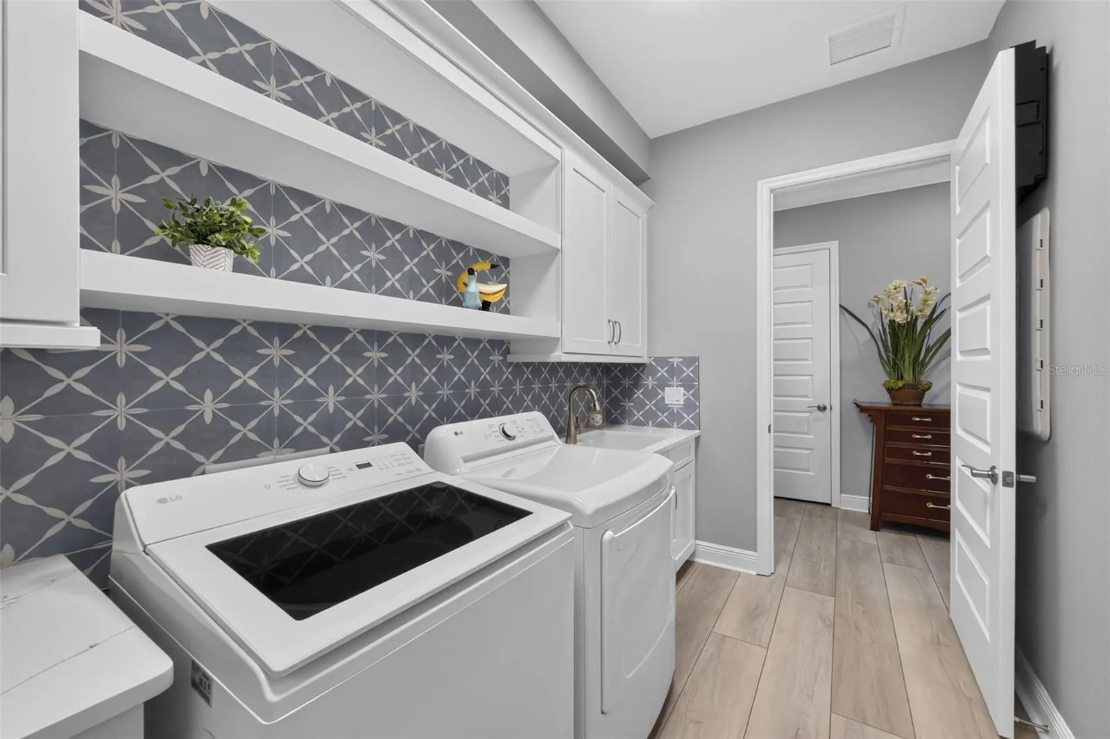 Laundry room - washer and dryer are included in the sale