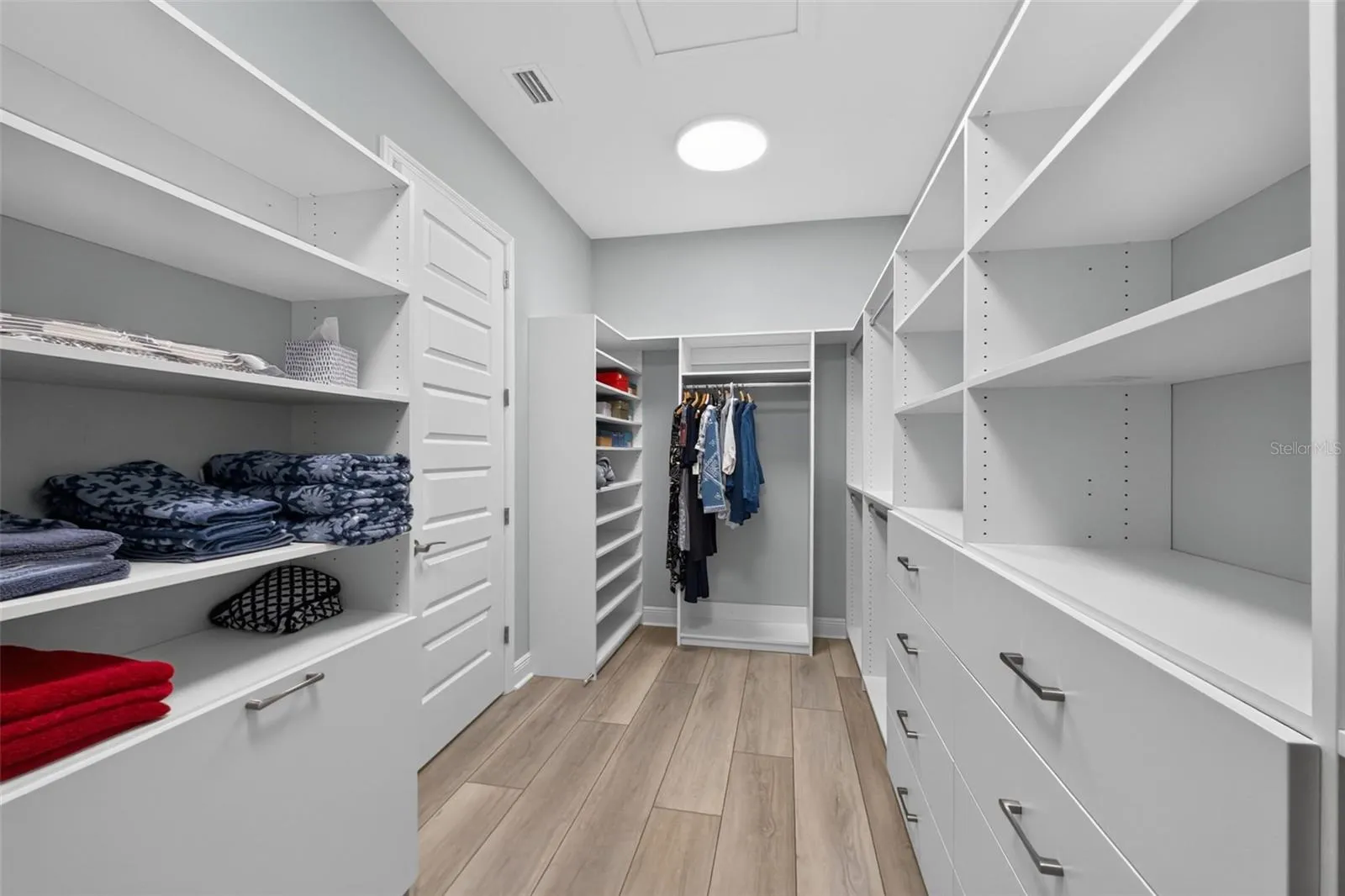 Primary Bedroom walk in closet