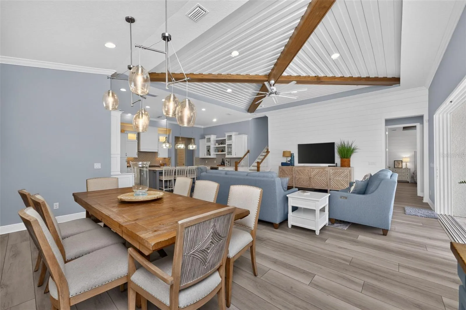 Dining area features upgraded beautiful double light fixture.