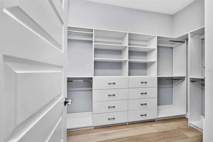 Primary Bedroom walk in closet
