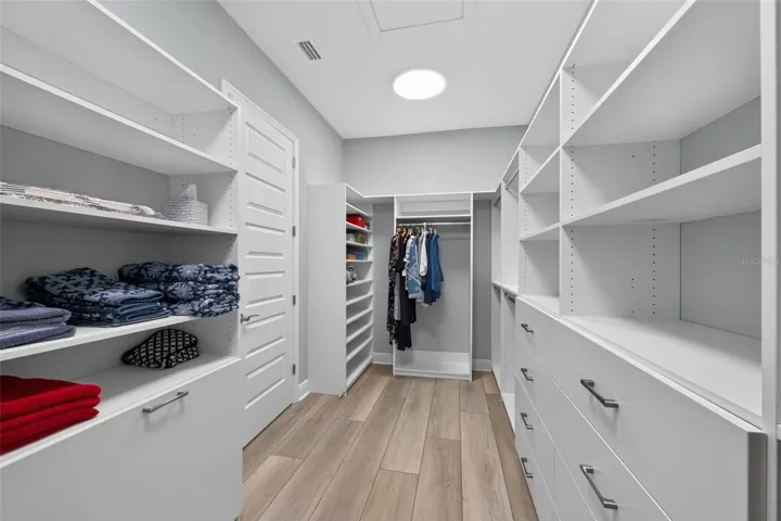 Primary Bedroom walk in closet