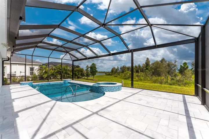 Custom built pool with swim shelf and spa, plus two spill over basins