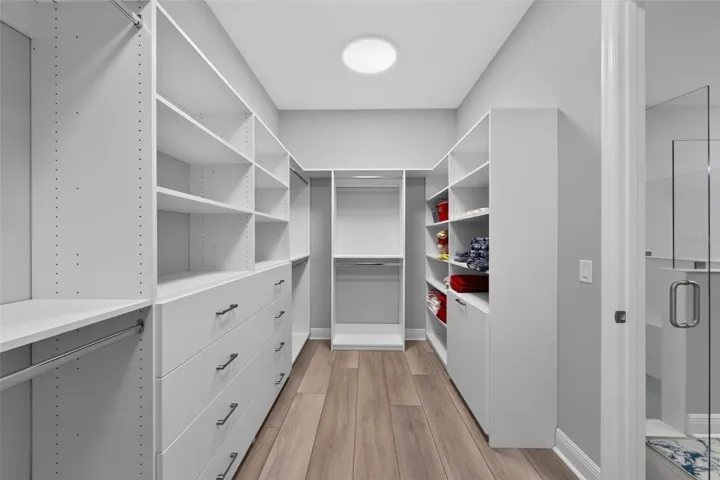 Primary Bedroom walk in closet