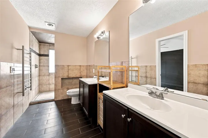 Primary Bathroom - Dual sinks and walk in shower