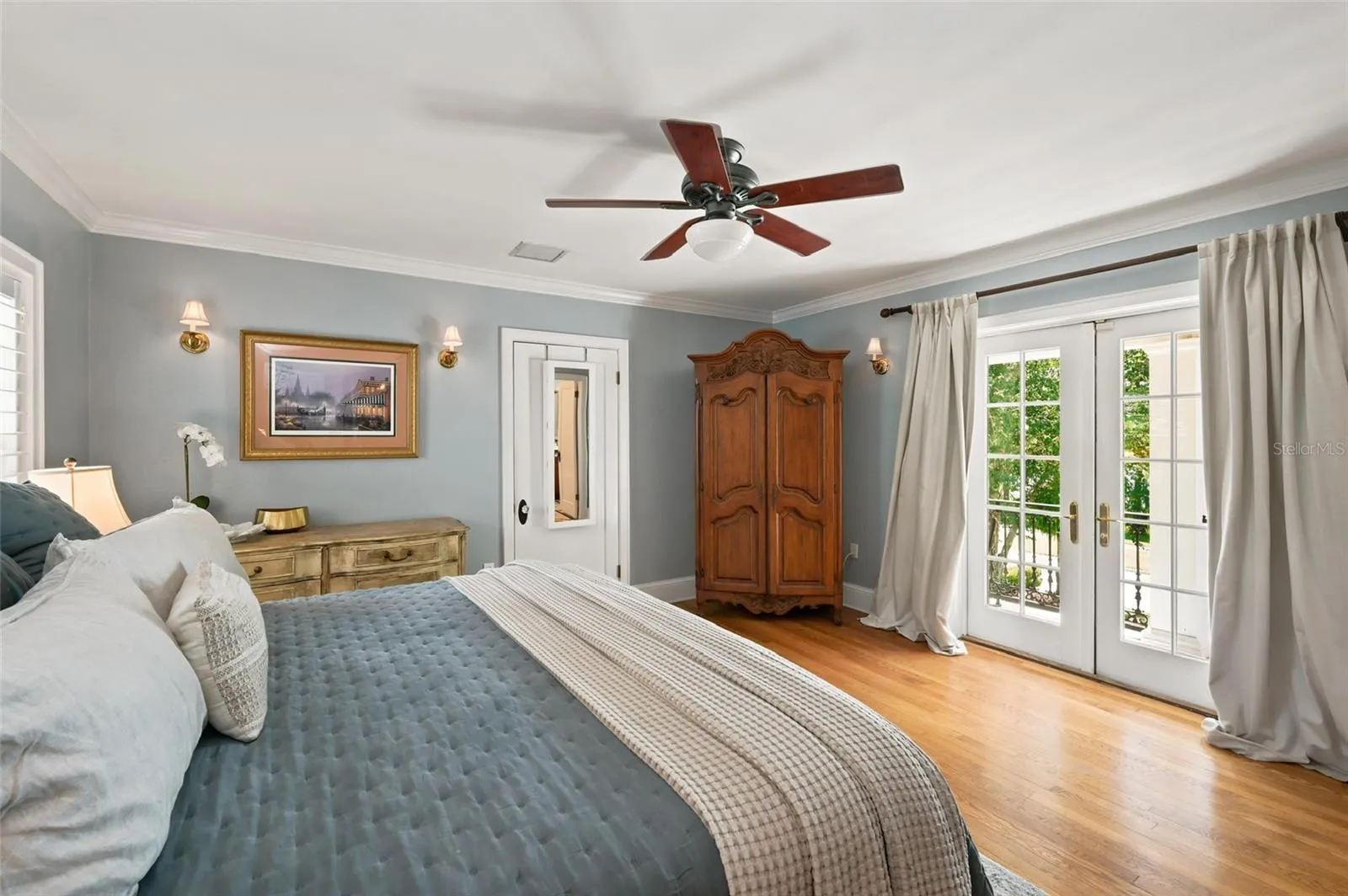 Second-Floor Primary Suite with French Doors to Private Balcony