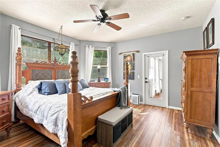 Spacious upstairs primary suite with access to covered lanai