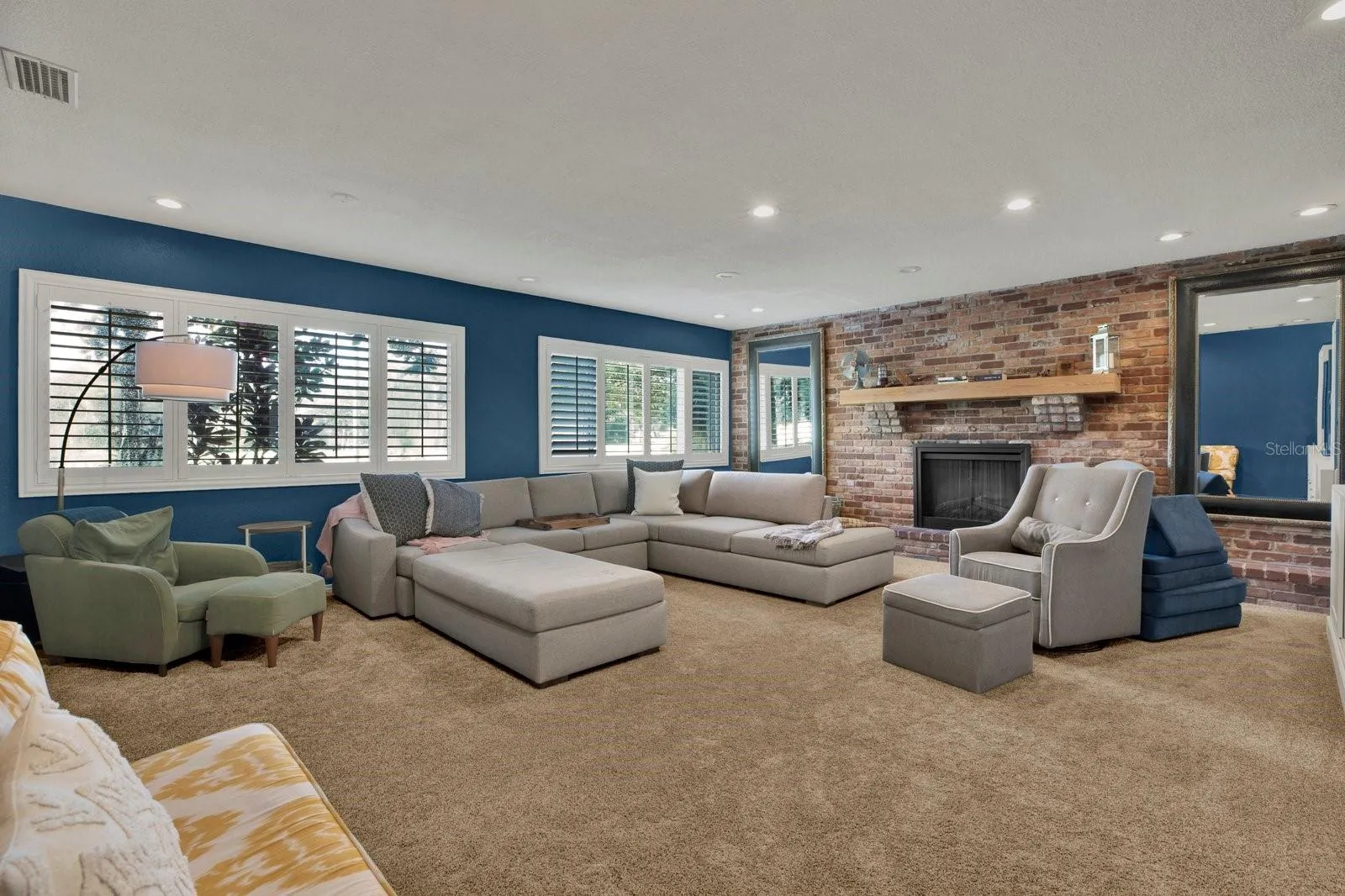 Media/bonus room offers a cozy second gathering space.