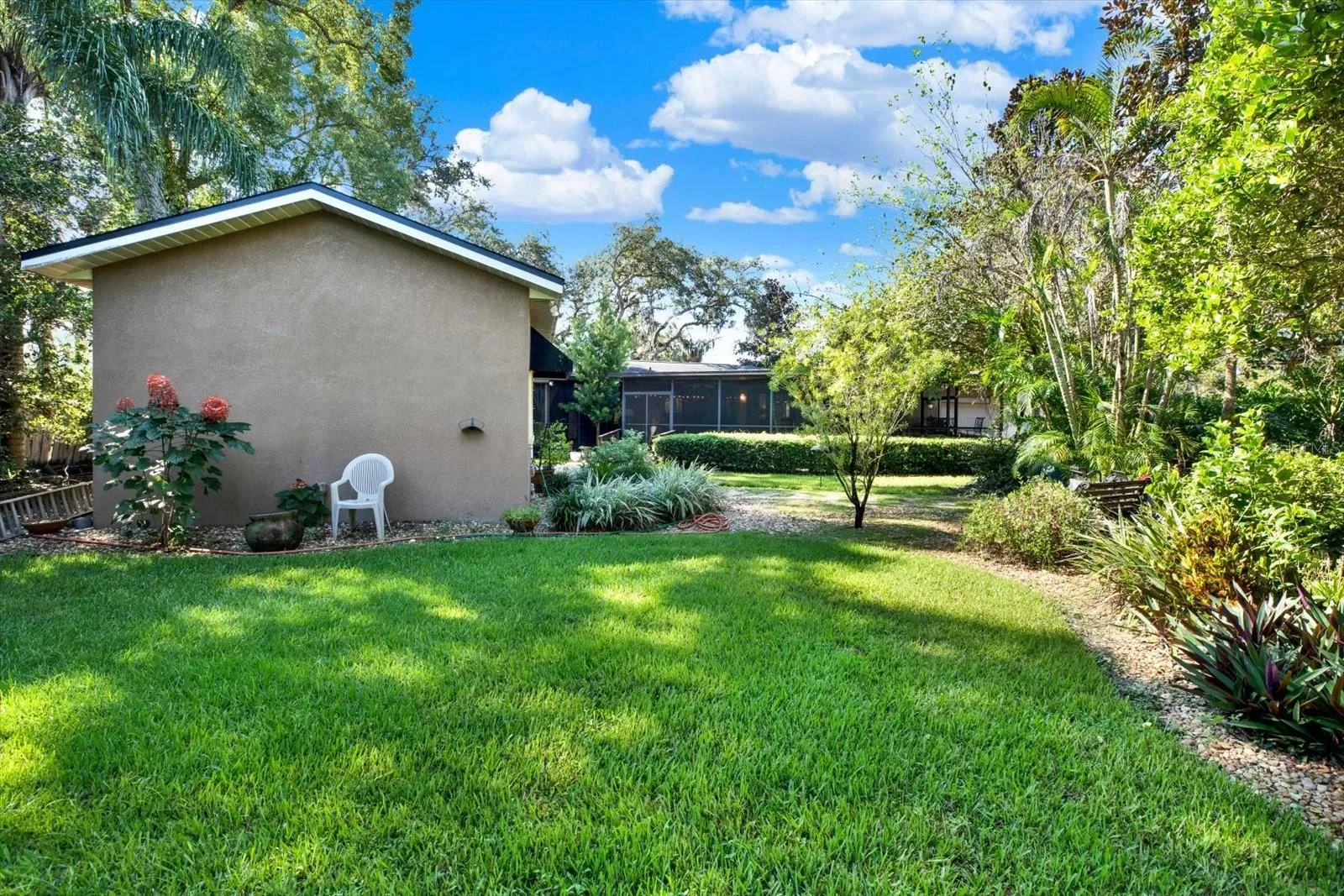 Private backyard retreat surrounded by mature landscaping.