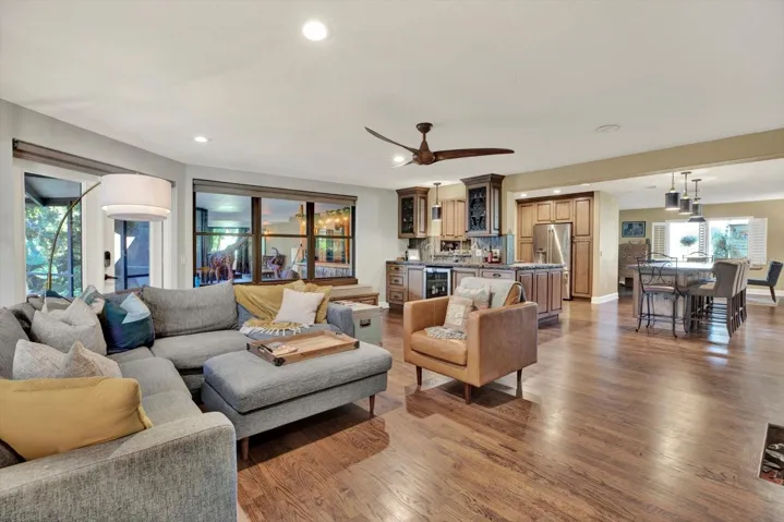 Open-concept family room with hardwood floors throughout.