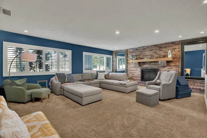 Media/bonus room offers a cozy second gathering space.