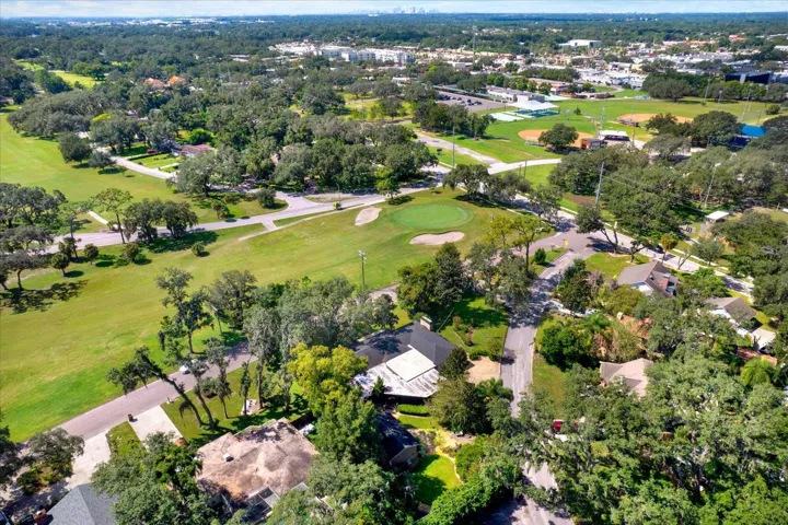 Aerial view showing the home's frontage on the historic Temple Terrace Golf Course.