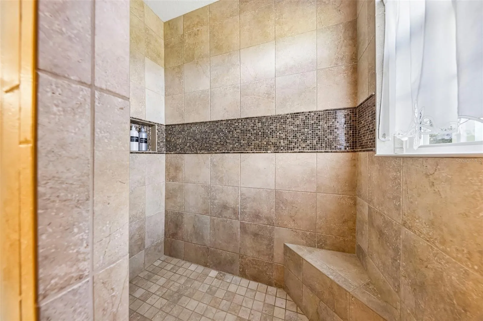 Roman Shower in Primary Bathroom