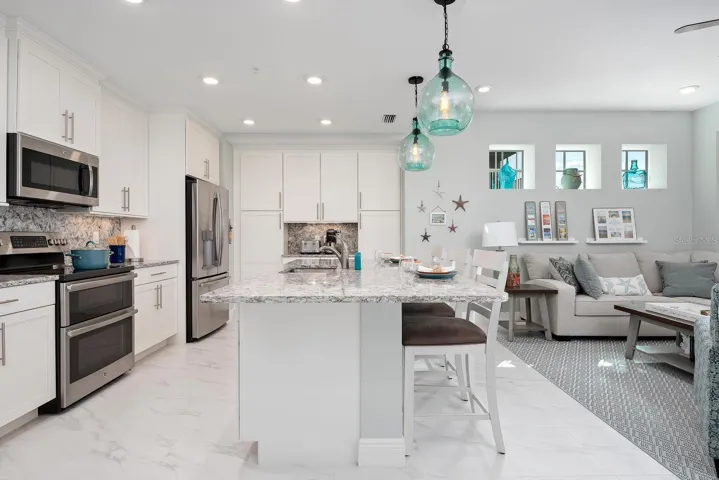 craftsman style kitchen with granite and large island