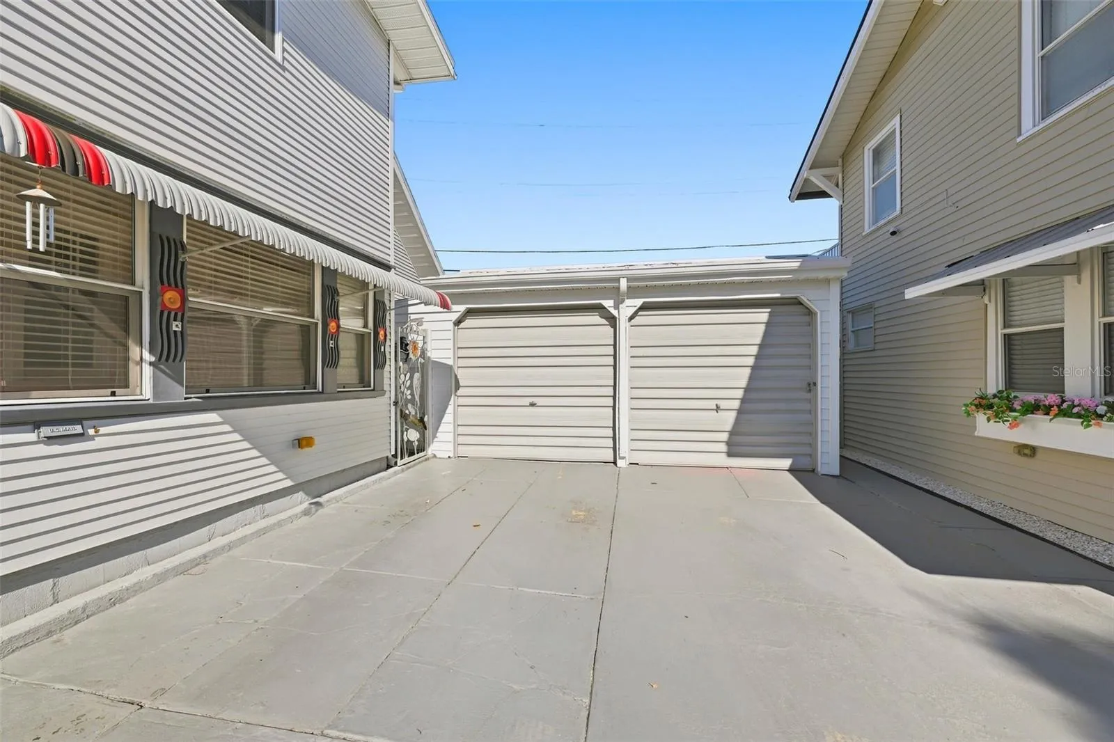 Shared Garage With Additional Parking.