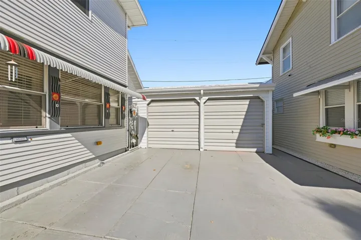 Shared Garage With Additional Parking.