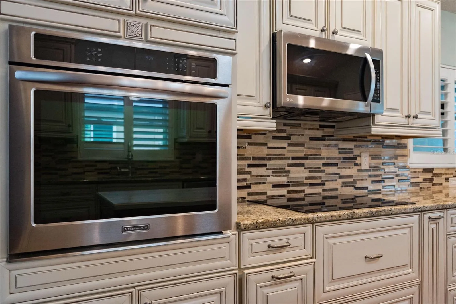 custom buiit in oven and countertop cookstove. The cabinetry was specially made to accomdoate pots and pans as well with pull out drawers.