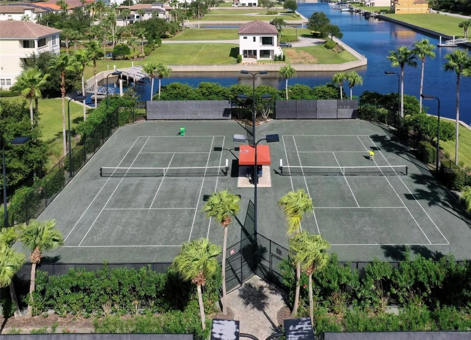 YACHT HARBOR VILLAGE – AERIAL VIEW OF RACQUET COURTS* OPTIONAL CLUB MEMBERSHIP MAY BE REQUIRED – BUYER TO VERIFY MEMBERSHIP AVAILABILITY, FEES &amp; AMENITY ACCESS.