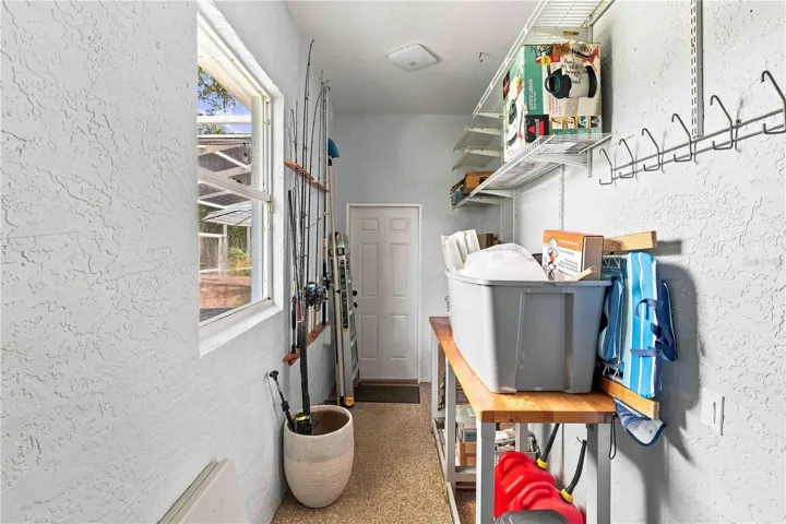A handy storage room off the lanai — ideal for fishing gear, pool toys, and outdoor equipment