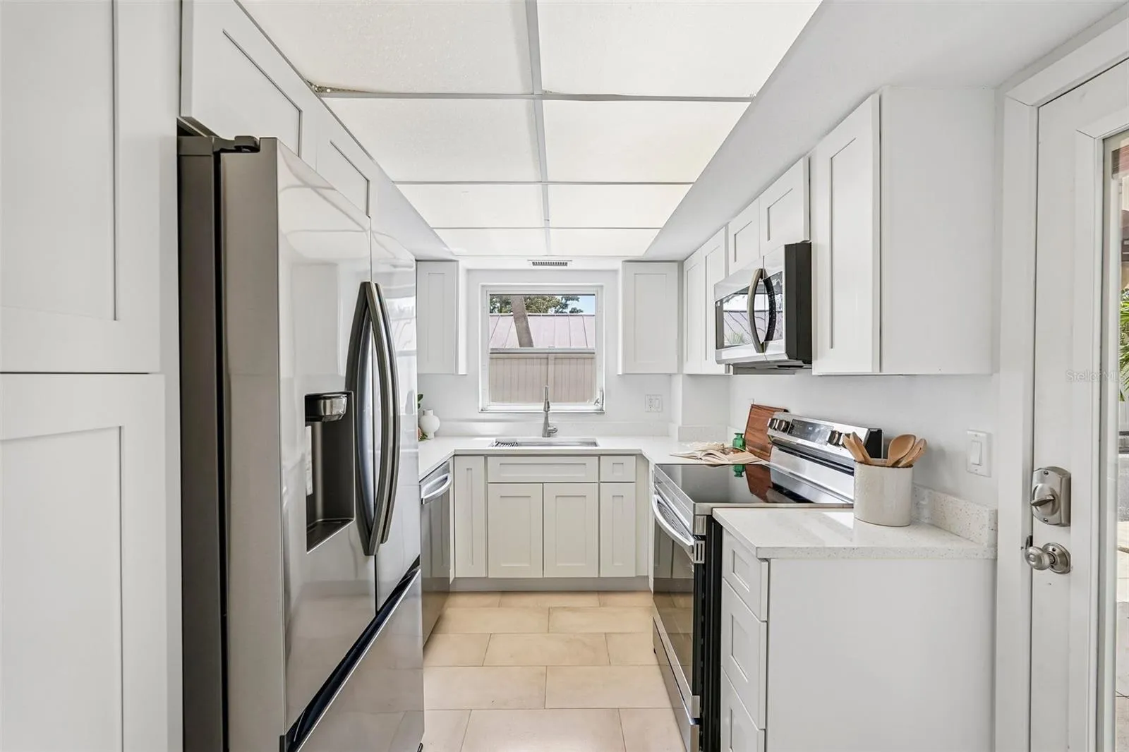 White Shaker Cabinets and Quartz Countertops