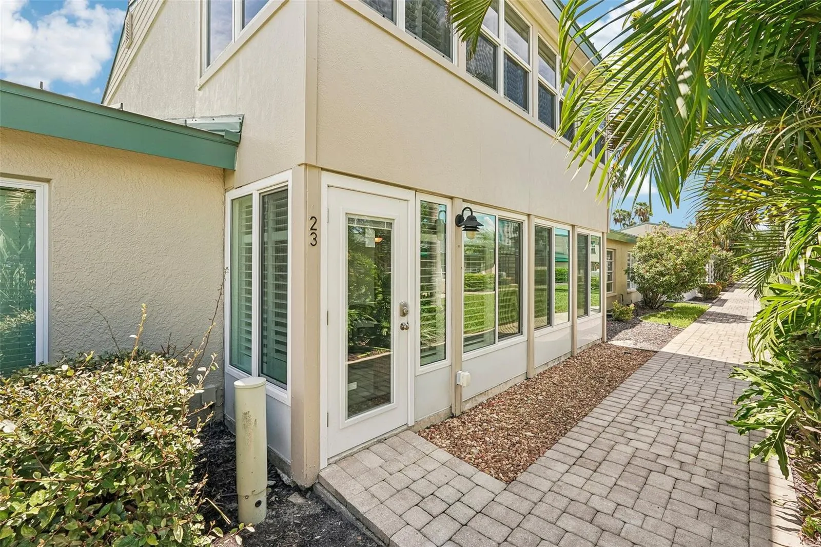 Lovely courtyard with easy access to pool and beach.