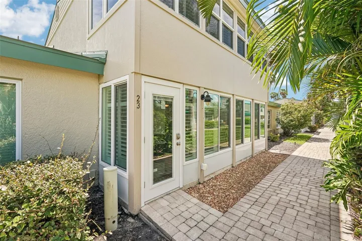 Lovely courtyard with easy access to pool and beach.