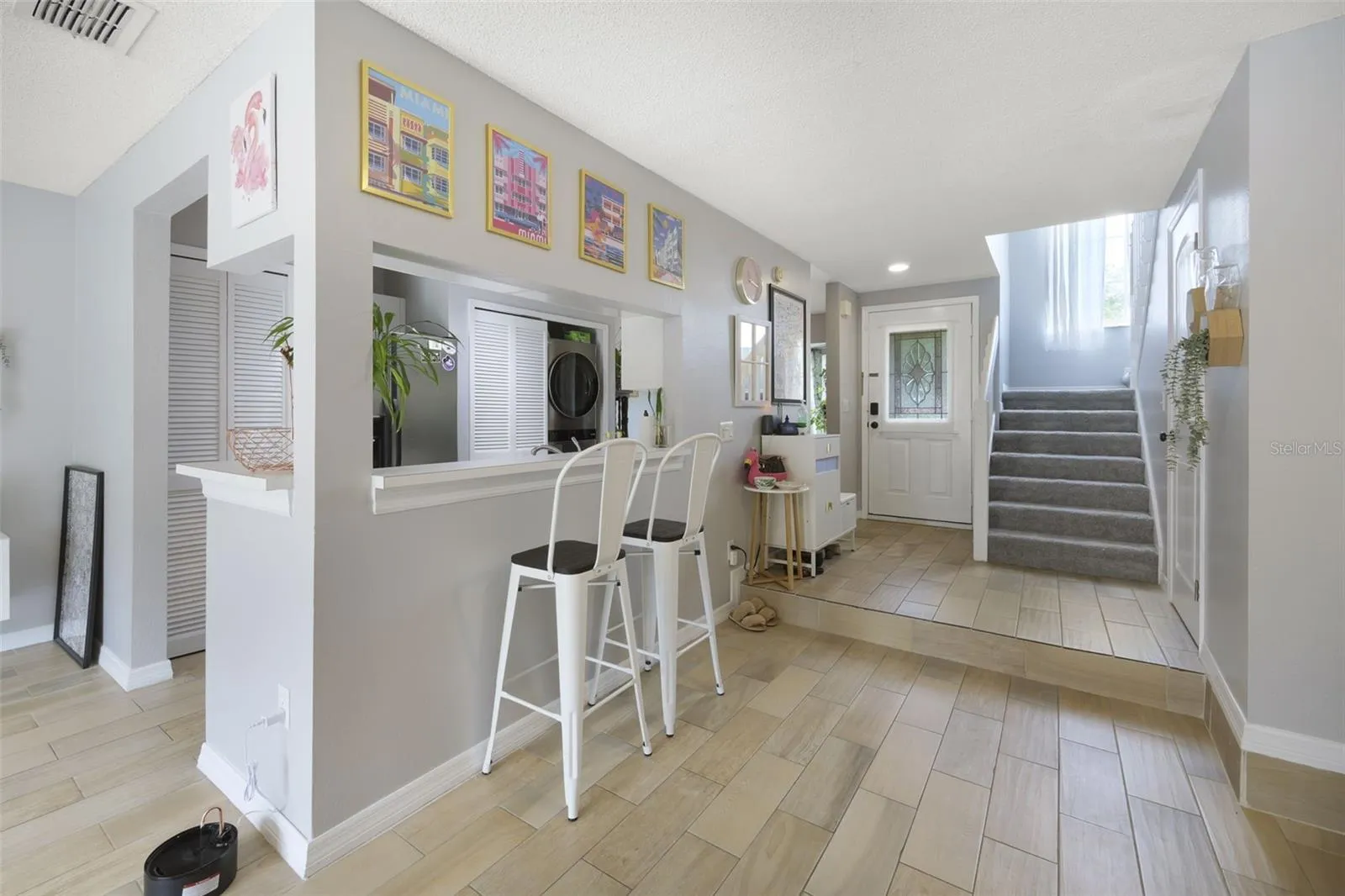 Character filled condo that lives like a townhome.