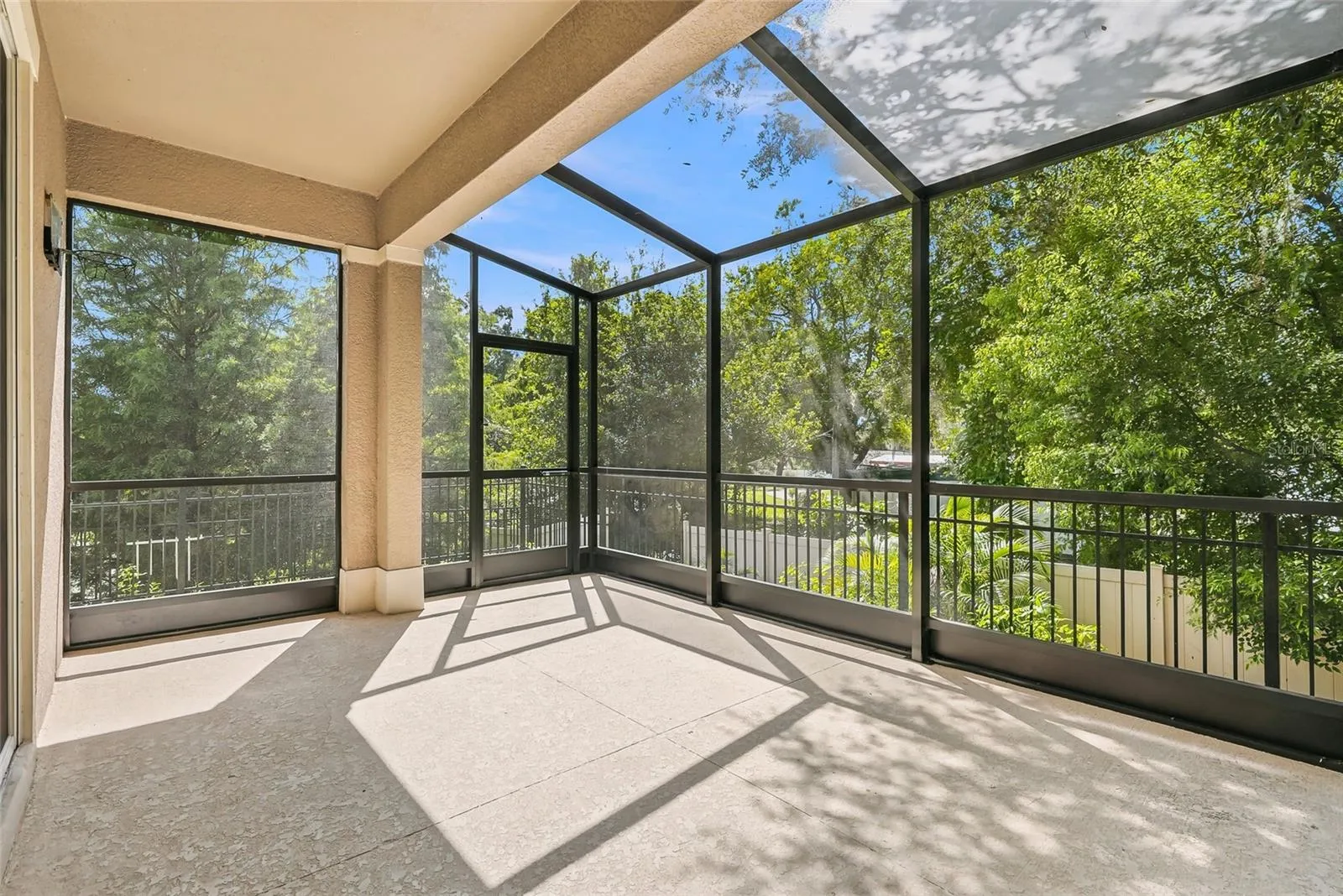 Fully Screened in LARGE LANAI with Side door in Partial fenced yard