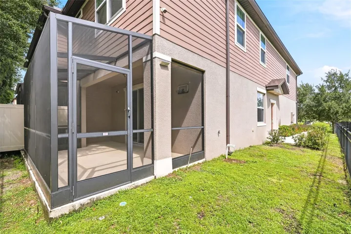 CORNER UNIT - PARTIALLY FENCED - OVERLOOKS A BEAUTIFUL POND